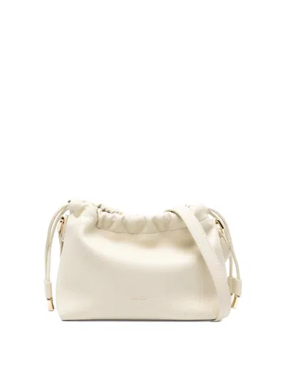 A.p.c. Mini Ninon Drawstring Shoulder Bag In Neutral