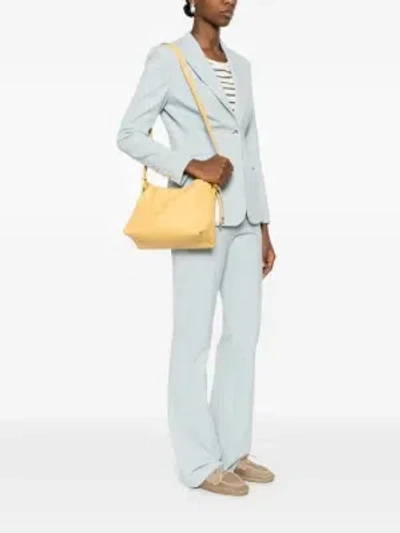 A.p.c. Ninon Drawstring Shoulder Bag In Yellow