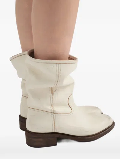 Prada Vintage-effect Leather Boots In Black