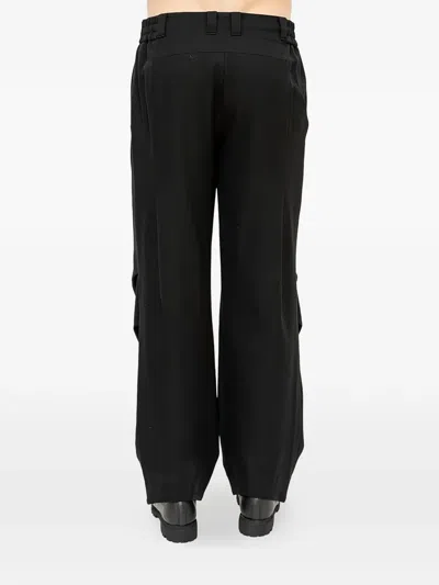 Devoa Wool Trousers With Pleats In Black