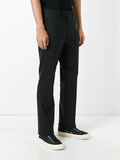 Shop Raf Simons Slightly Flared Trousers In Black