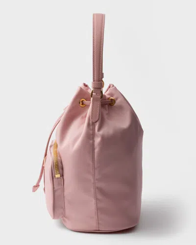Prada Re-nylon Triangle-logo Drawstring Bucket Bag In Pink