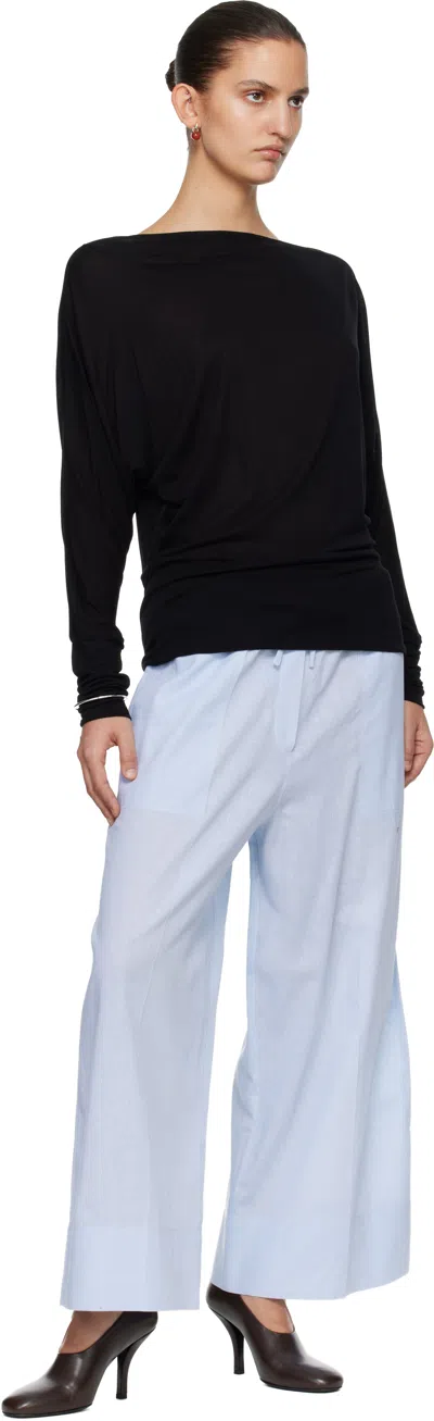 Totême Womens Sky Logo-embroidered Wide-leg Cotton And Linen Trousers In Animal Print