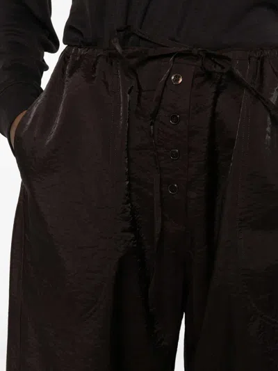 Studio Nicholson Pants In Brown