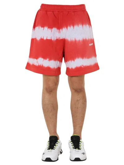 Msgm Relaxed Fit Red Tie-dye Bermuda Shorts In Red