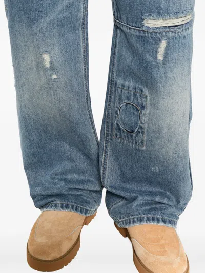 Found Distressed Patchwork Jeans In Blue