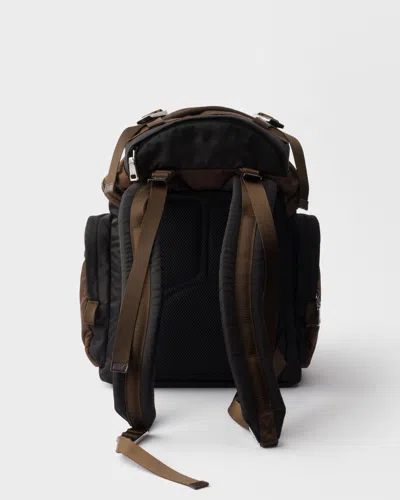 Prada Re-nylon And Saffiano Leather Backpack In Brown