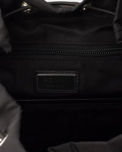 Prada Re-nylon And Saffiano Leather Backpack In Brown