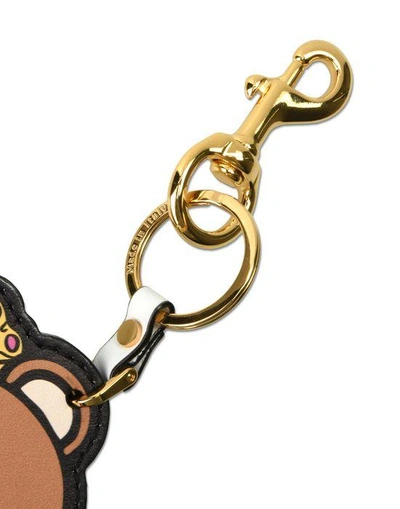 Shop Moschino Key Rings - Item 46497358 In White