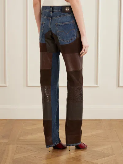 Versace Patchwork Panelled Jeans In Multi