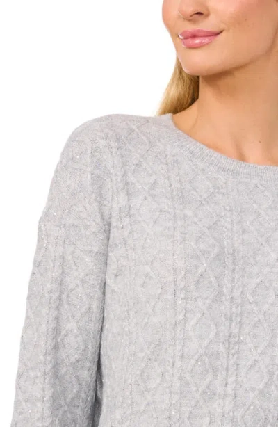 Cece Sequin Cable Stitch Sweater In Silver