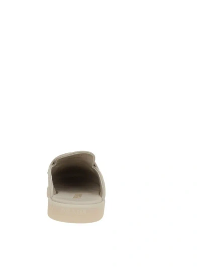 Prada Triangle-logo Mules In Neutral