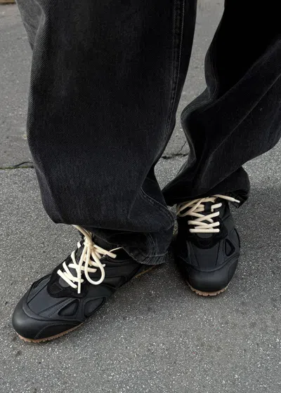 Axel Arigato Slow Runner Black Sneaker With Insert Design And Grooved Sole In Leather And Suede Woman