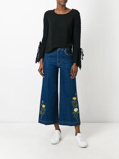 Shop Stella Mccartney Floral Patch Flared Jeans In Blue