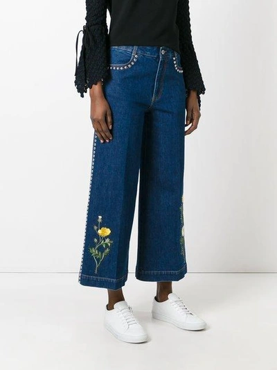 Shop Stella Mccartney Floral Patch Flared Jeans In Blue
