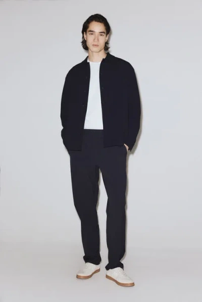 H&m Four-way Stretch Regular-fit Pull-on Pants In Black