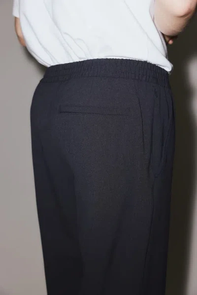 H&m Four-way Stretch Regular-fit Pull-on Pants In Black