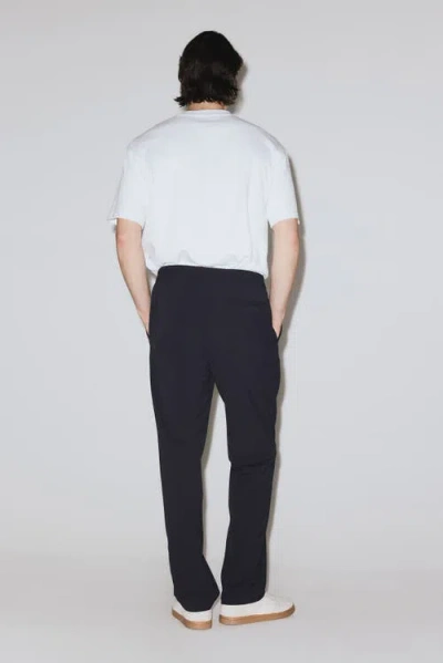 H&m Four-way Stretch Regular-fit Pull-on Pants In Black