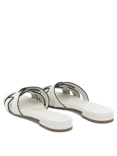 Sergio Levantesi "norma" Slides In White