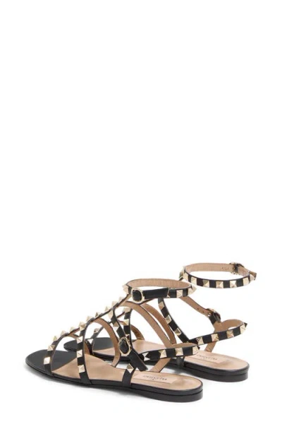 Valentino Garavani Rockstud Flat Calfskin Sandal With Straps Woman Black 40 In Black