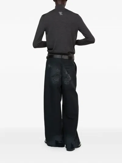 Acne Studios Mended Distressed Trousers In Black