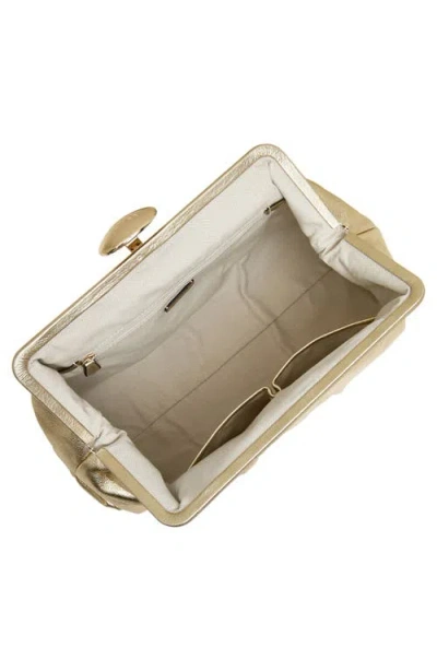 Aimee Extra Large Full Circle Frame Clutch In Gold