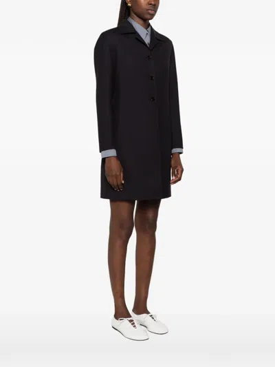Jil Sander Single-breasted Buttoned Coat In Black