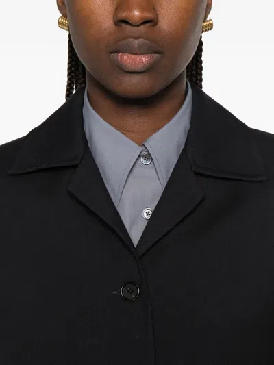 Jil Sander Single-breasted Buttoned Coat In Black