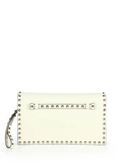 Shop Valentino Rockstud Leather Flap Clutch In Ivory