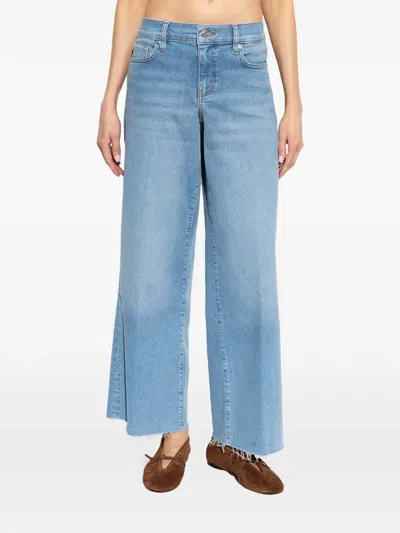Frame Raw-edge Jeans In Blue