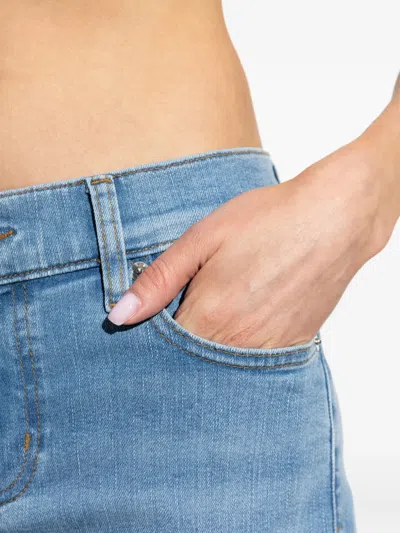 Frame Raw-edge Jeans In Blue