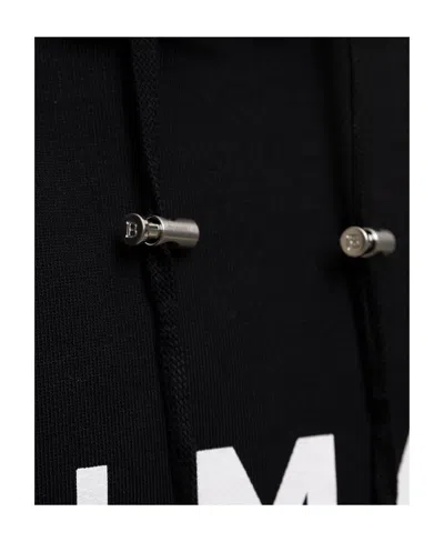Balmain Logo Printed Drawstring Sweatshirt In Black