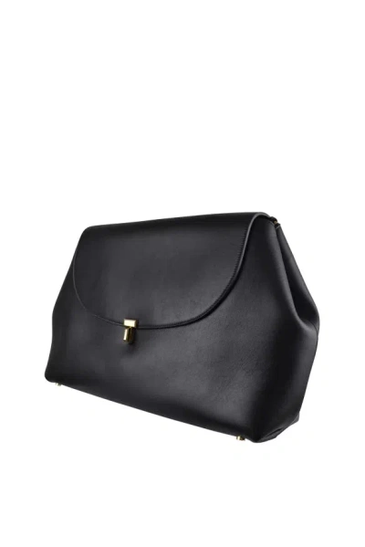 Totême T-lock Foldover Top Shoulder Bag In Black