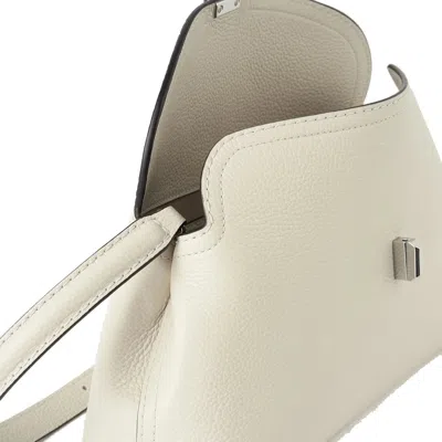 Totême T-lock Smooth-leather Convertible Clutch In Milk In Neutral