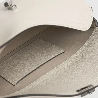 Totême T-lock Smooth-leather Convertible Clutch In Milk In Neutral