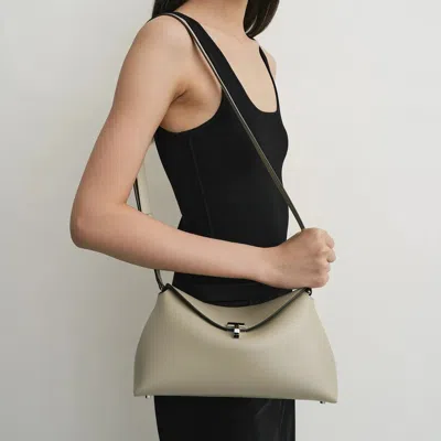 Totême T-lock Smooth-leather Convertible Clutch In Milk In Neutral