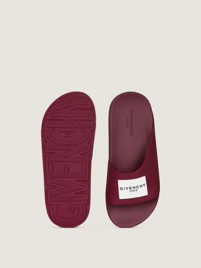 Givenchy Label Flat Mules In Rubber In Brown