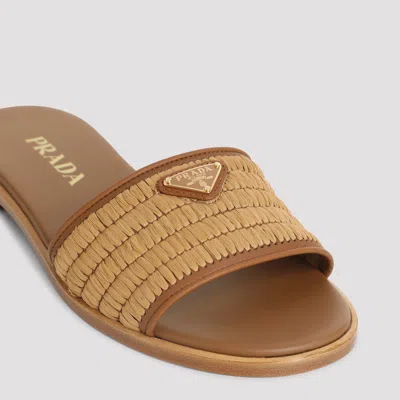 Prada Triangle Logo Raffia Flat Slide Sandals In Brown
