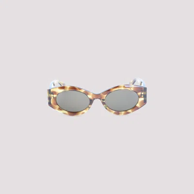 Alaïa Acetate Oval Frame Patterned Sunglasses In Gold