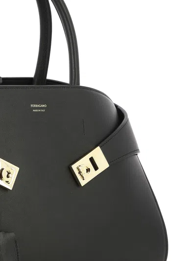 Ferragamo Medium Hug Leather Top Handle Bag In Black