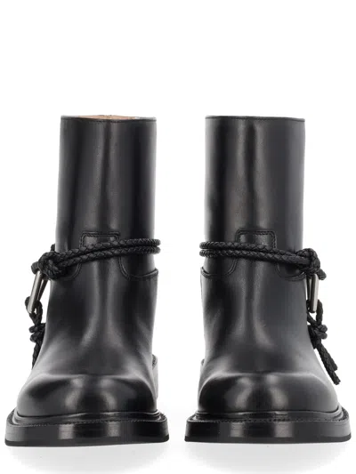 Bottega Veneta Women Black Ankle Boots With Metallic Detail On The Side And Applied Laces In Leather