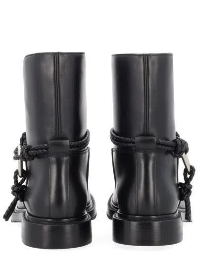 Bottega Veneta Women Black Ankle Boots With Metallic Detail On The Side And Applied Laces In Leather