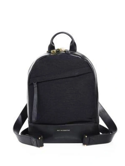 Want Les Essentiels De La Vie Mini Piper Leather & Crepe Backpack In Black