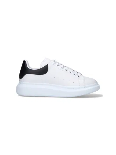 Alexander Mcqueen Men White And Black Low-top Sneakers With Chunky Sole And Contrasting Heel Tab In
