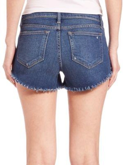 Shop L Agence Zoe Distressed Perfect-fit Shorts In Blue