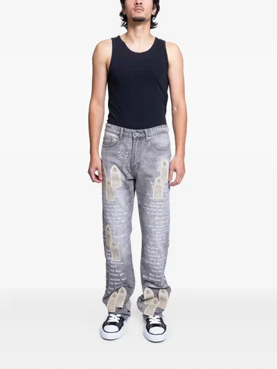 Who Decides War Scripture-print Jeans In Blue