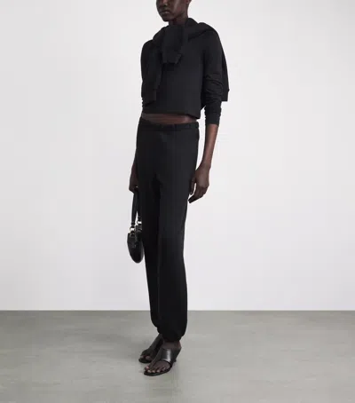 Éterne Long-sleeve Cropped T-shirt In Black