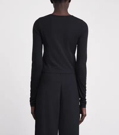 Éterne Long-sleeve Cropped T-shirt In Black