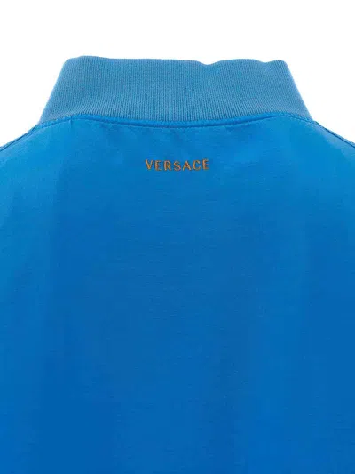 Versace Relaxed Fit Silk Jacket With Embroidered Logo And Zipper Closure In Blue