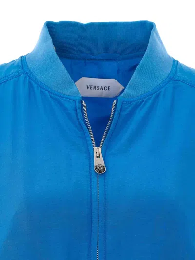Versace Relaxed Fit Silk Jacket With Embroidered Logo And Zipper Closure In Blue